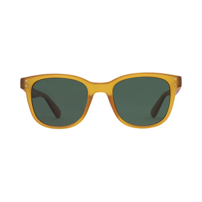 Yellow sunglasses with dark lenses on a light gray background